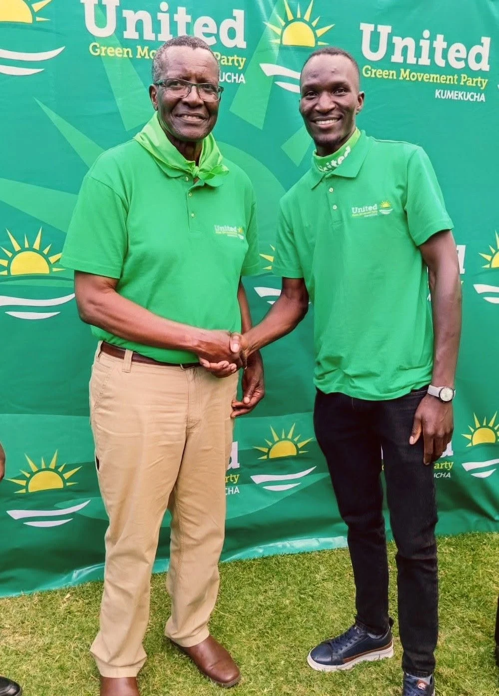 Maxwell Changilwa shaking hands at a United Green Movement Party event