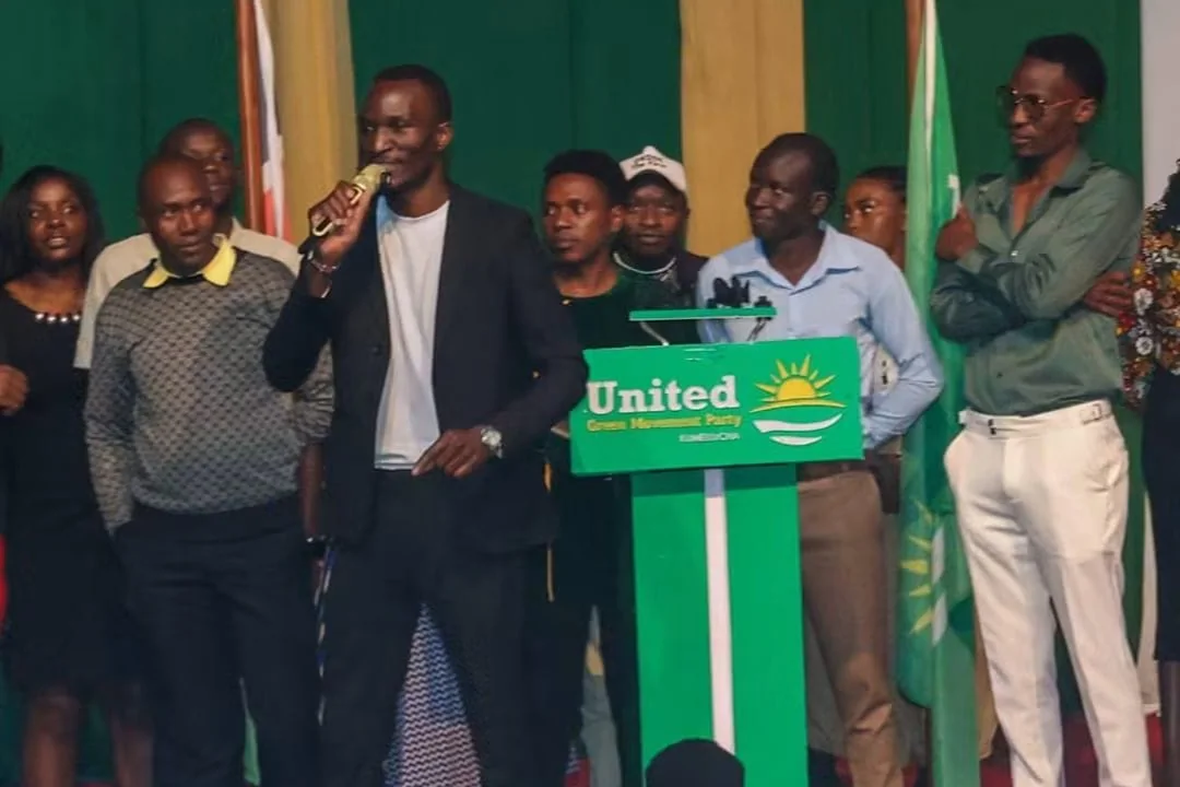Speaking on stage at a United Green Movement Party event